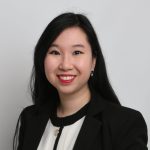 Veronique Duong standing up with her last SEO Google book for chinese people